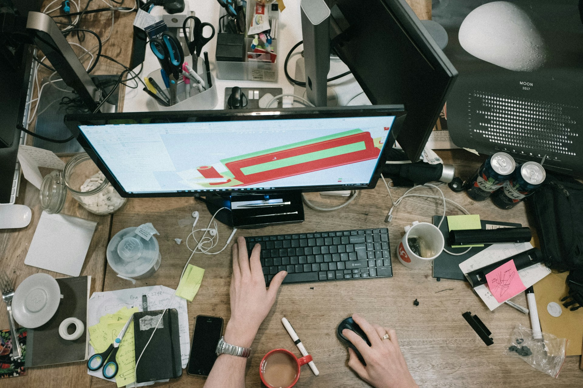 cluttered desk / unsplash